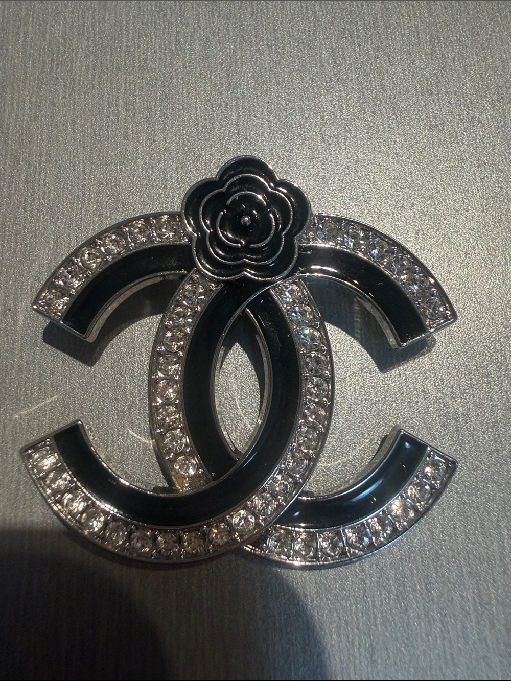 Inspired Black and Silver Crystal Camellia Logo Brooch
